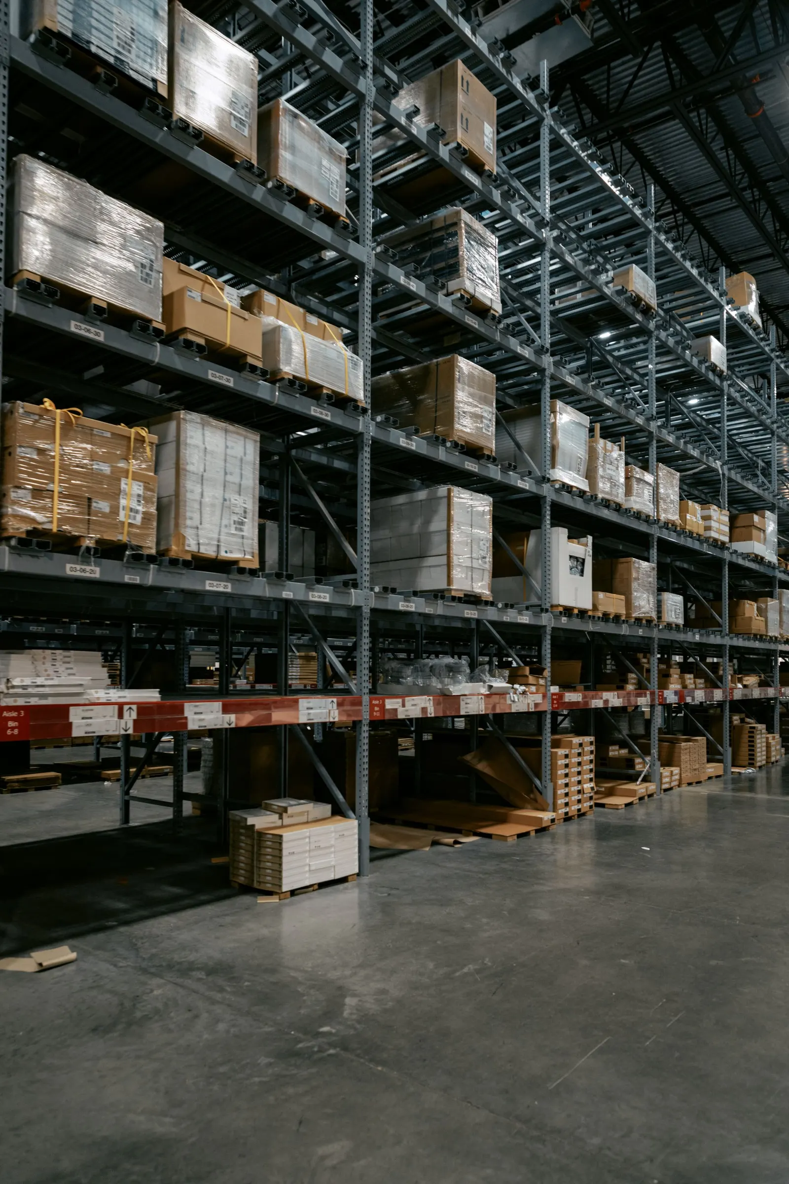 Industrial warehouse with pallet racking and stocked goods